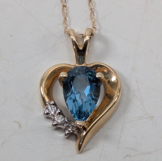 14K Yellow Gold Heart Necklace w/ (1) Blue Stone & (3) Clear Stone Accents